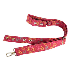 Tragegurt inkl. Verlängerungsgurt für Bauchtasche sowie Crossbodybag aus Canvas in Rot mit großem Pfotendruck.