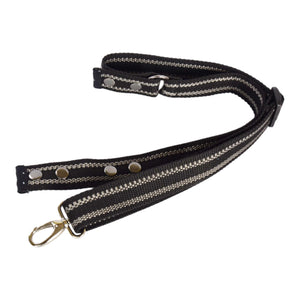 Tragegurt inkl. Verlängerungsgurt für Bauchtasche sowie Crossbodybag aus Dari-Stoff mit schwarz, weißen senkrechten Streifen.