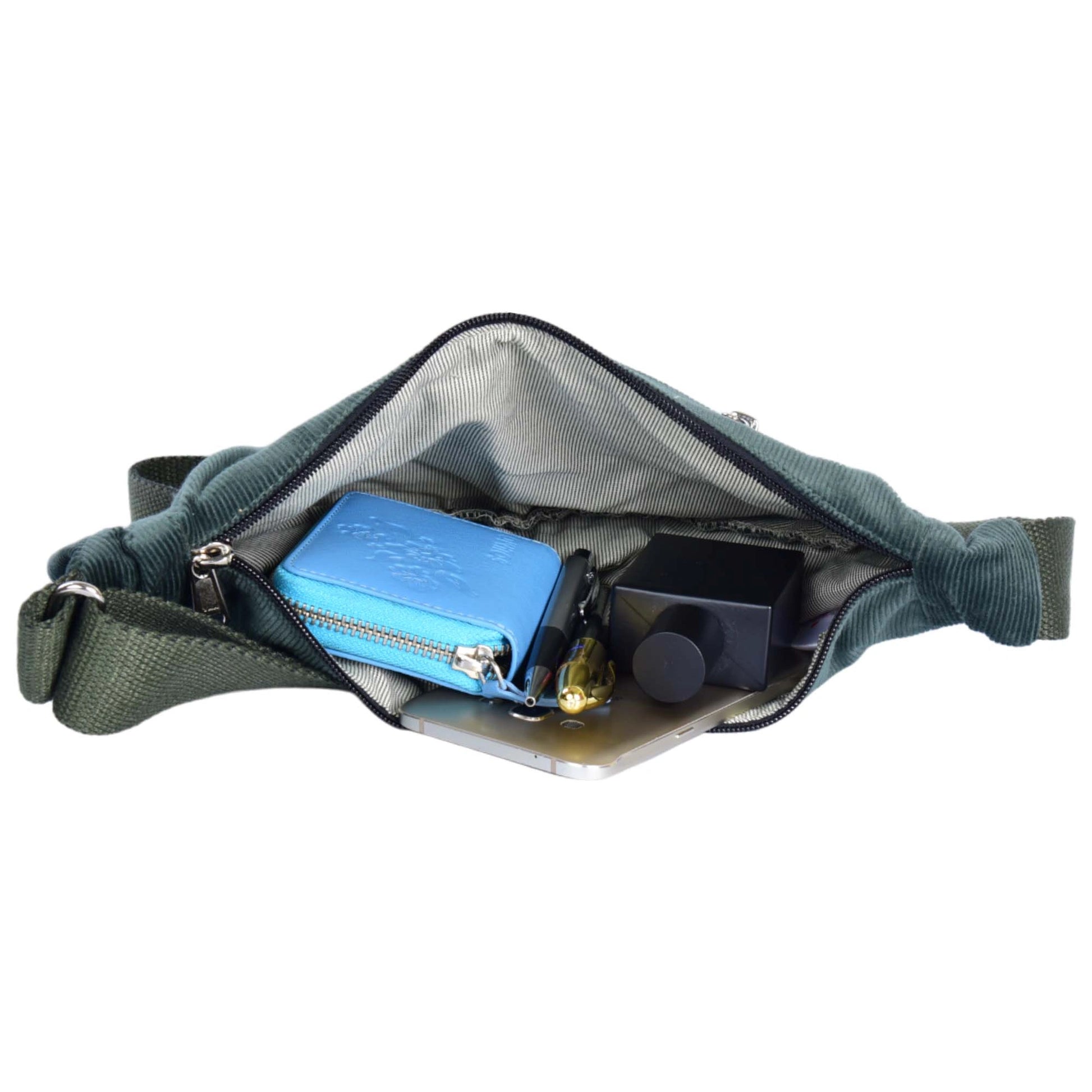 Crossbody-Bag, kleine Umhängetasche aus Cord samt, in Olivgrün. Hauptfach und Seitenfach außen sind mit einem Reißverschluss verschließbar.