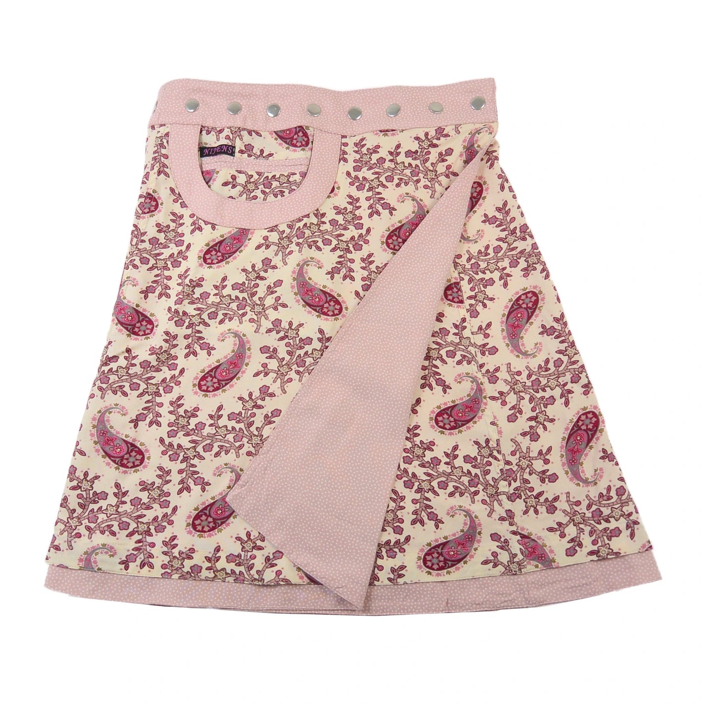 Beidseitig tragbarer Wickelrock mit Eingriffstasche und Einsteckfach aus Baumwolle in Rosa und Beige mit Dots- und Paisleymuster. Rockbund ist mit einer Druckknopfleiste einstellbar.