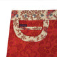 Beidseitig tragbarer Wickelrock mit Eingriffstasche und Einsteckfach aus Baumwolle in Rot und Beige mit  Muster - und Paisley.