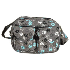 Gassi-Tasche, Bauchtasche sowie UmhĂ€ngetasche aus Canvas-Stoff, Grau mit vielen groĂen farbigen Pfoten, ReiĂverschlussfach vorne mit zwei aufgesetzten, auswaschbaren LeckerliefĂ€chern.