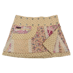 Sommerrock aus Baumwolle Gelb in buntem Mustermix. Umfang ist verstellbar mit doppelter Druckknopfleiste mit Seitentasche.