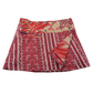 Sommerrock aus Baumwolle in Magenta/Bordeaux im Mustermix. Umfang ist verstellbar mit doppelter Druckknopfleiste mit Einsteckfach.