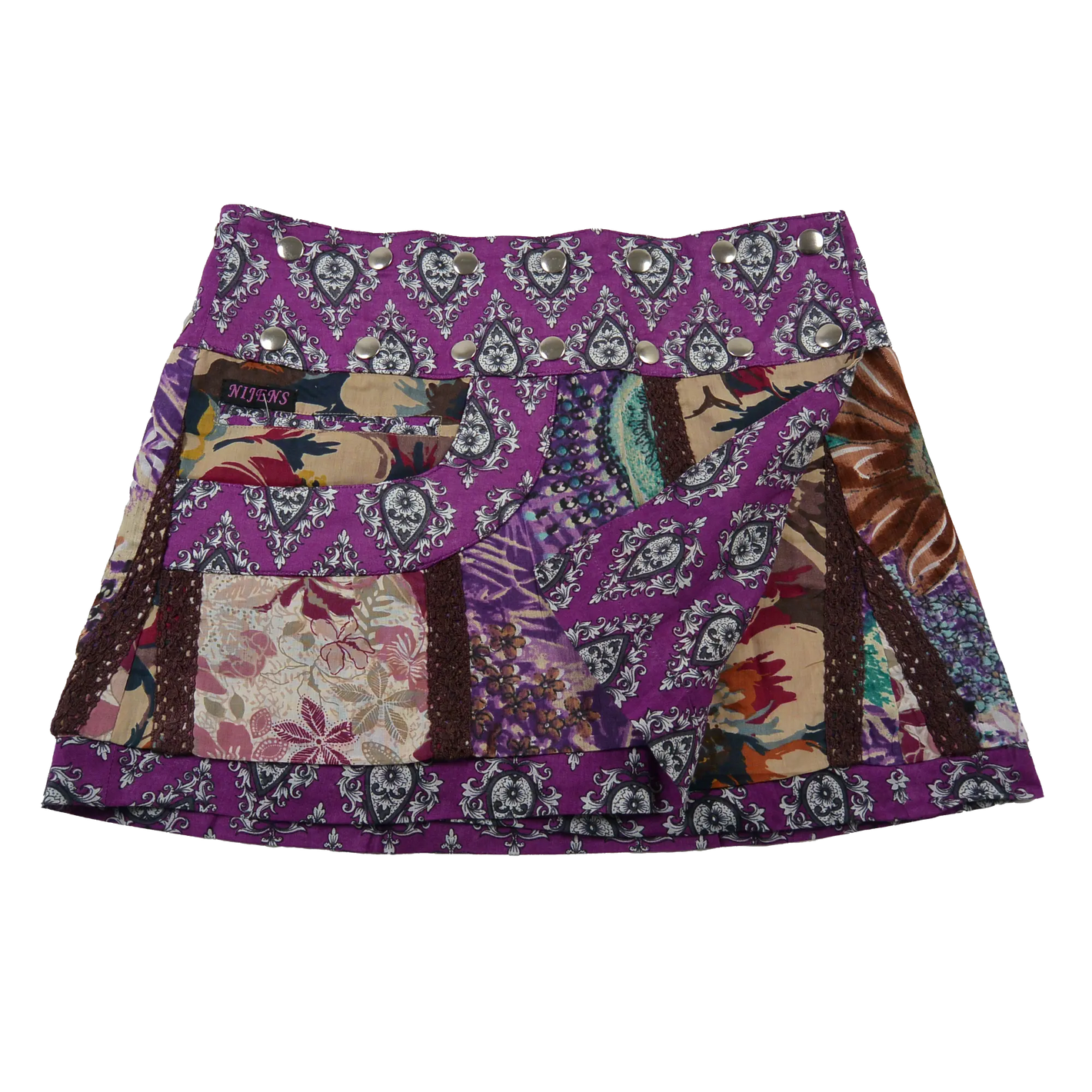 Sommerrock aus Baumwolle in Violett/Lila im Mustermix. Umfang ist verstellbar mit doppelter Druckknopfleiste mit Seitentasche.