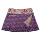 Sommerrock aus Baumwolle in Lila im Mustermix. Umfang ist verstellbar mit doppelter Druckknopfleiste mit Einsteckfach.