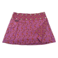 Sommerrock aus Baumwolle in Pink/Rot im Mustermix. Umfang ist verstellbar mit doppelter Druckknopfleiste mit Einsteckfach.