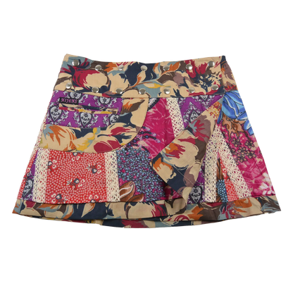 Sommerrock aus Baumwolle in Bunt im Mustermix. Umfang ist verstellbar mit doppelter Druckknopfleiste mit Seitentasche.