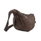 Schokobraune Cord-Crossbody-Tasche „Rishikesh“ von Nijens in Seitenansicht, mit verstellbarem Gurt