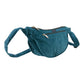 Petrolfarbene Crossbodybag „Rishikesh“ aus Cord von Nijens in Seitenansicht, mit zwei Reißverschlussfächern und verstellbarem Schultergurt