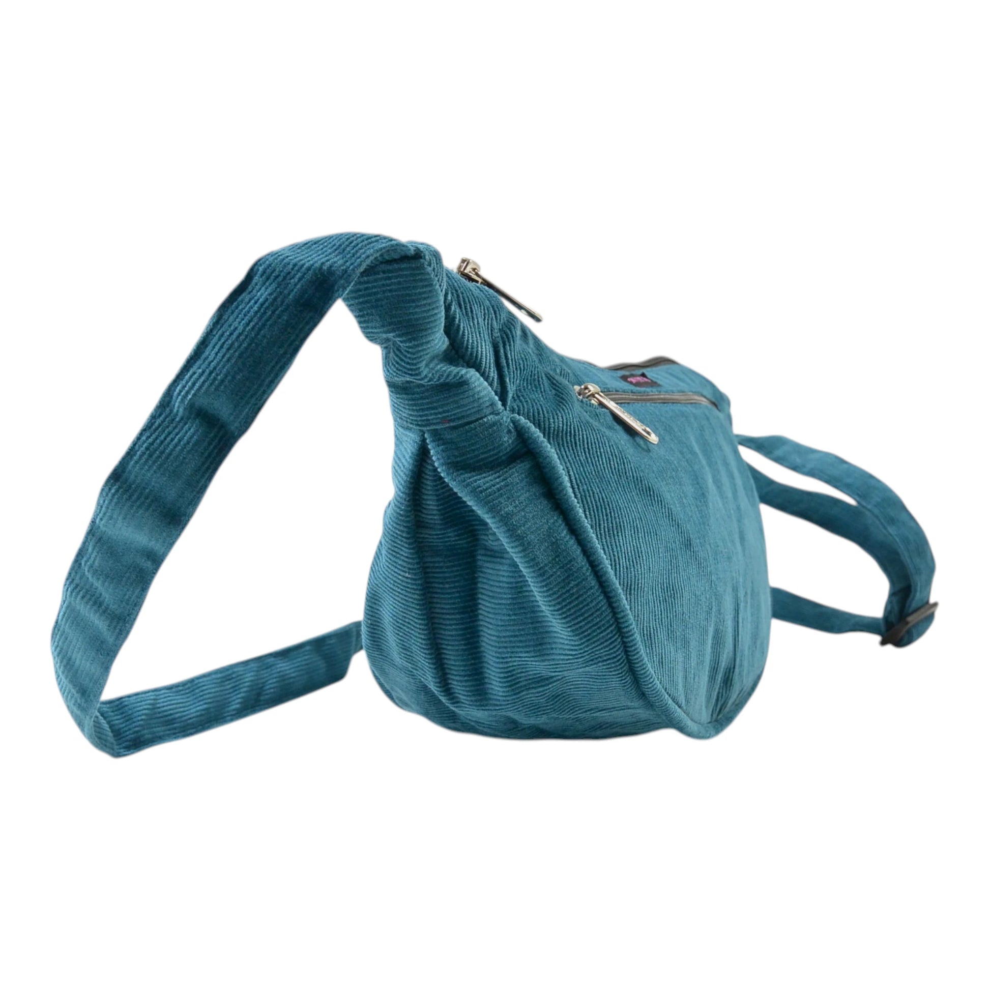 Petrolfarbene Crossbodybag „Rishikesh“ aus Cord von Nijens in Seitenansicht