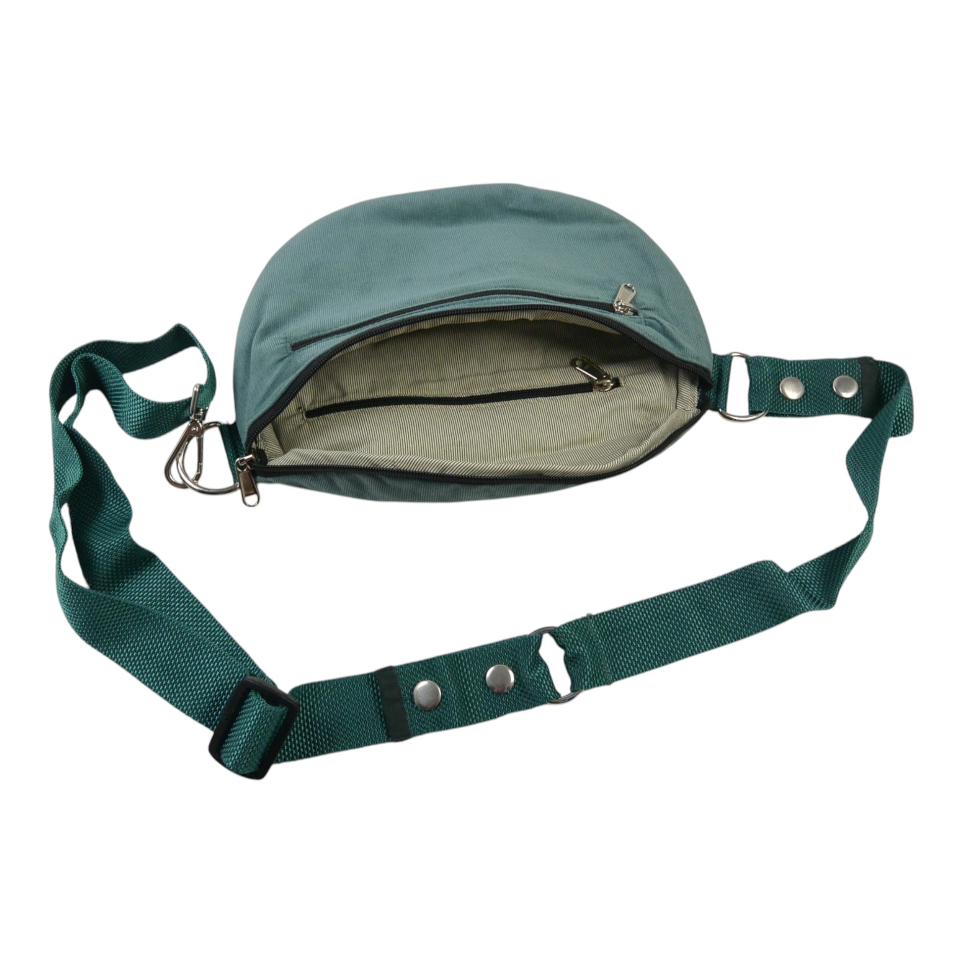 Salbeigrüne Cord Crossbody Bag mit geöffnetem Hauptfach, Innenfach und verstellbarem Schultergurt