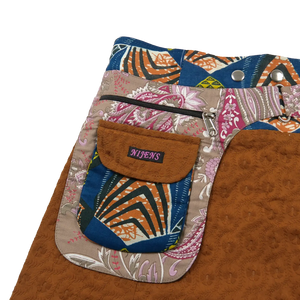 Sommerrock, Wickelrock aus besticktem Baumwollstoff Ockerfarben. Rockbund mit aufgesetzter Seitentasche.