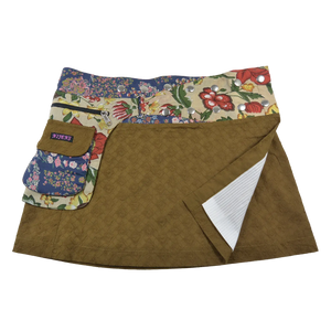 Sommerrock, Wickelrock aus besticktem Baumwollstoff Khaki. Rockbund mit aufgesetzter Seitentasche und doppelter Druckknopfleiste aus buntem Stoffmuster-Mix.