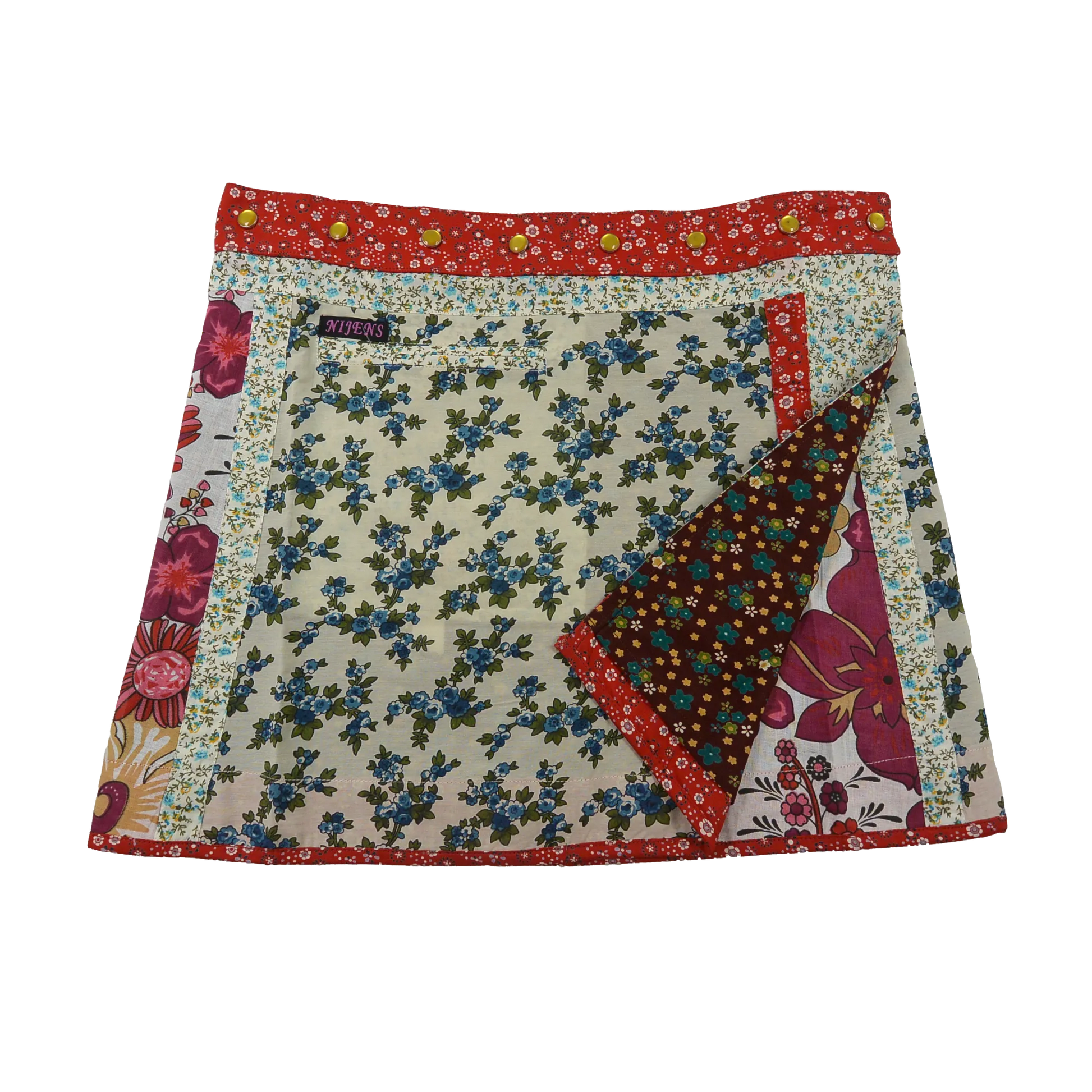 Wenderock aus Baumwolle mit Blumenmuster (weiß, rot) mit kleinem Einsteckfach vorne. Umfang ist einstellbar mit gläsernen Druckknöpfen am Rockbund. Muster und Farbenmix.