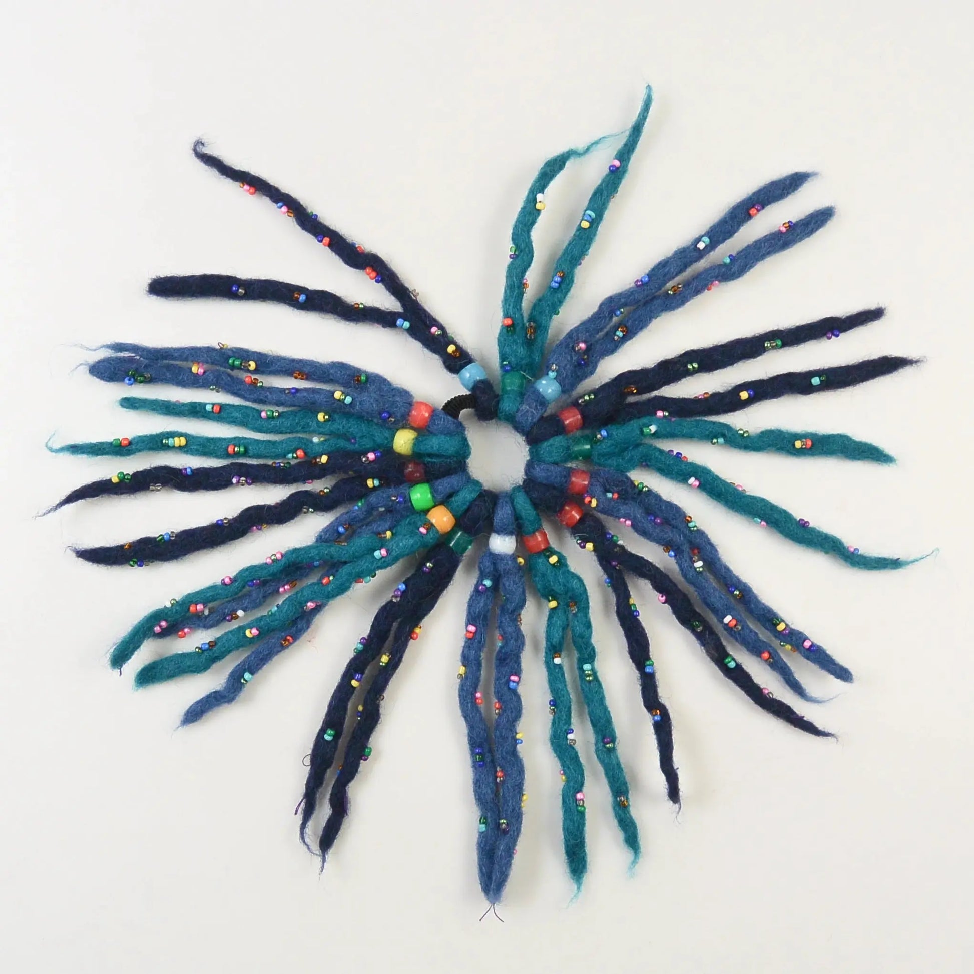 Filz Accessoires Fransen-Haargummi aus Wolle mit Perlen 116, 133 Nijens Shop