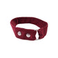 Verlängerungsgurt aus dunkelrotem Cord von Nijens, zu einem Ring geschlossen, mit silbernen Druckknöpfen und Metallring.