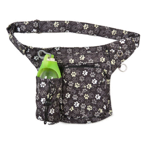 Schwarze Nijens-Hüfttasche mit farbigen Pfotenmotiven, grüner Flasche und Ring für Leine oder Karabiner.