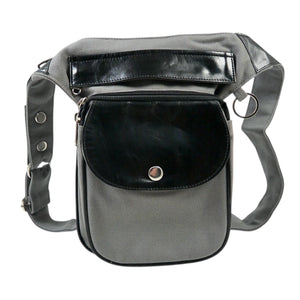 Gassitasche aus Canvas Grau mit echtem Leder in Schwarz, Frontansicht mit Druckknopf-Klappe, Reißverschlussfach und stabilem Gurt