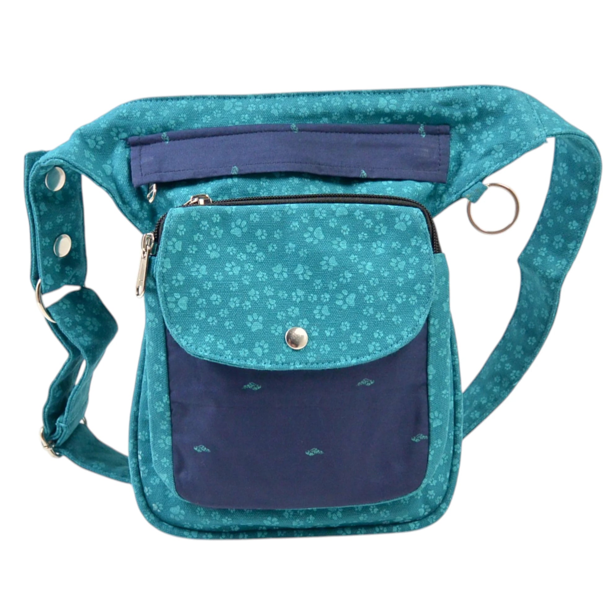 Vorderseite der Gassitasche mit türkisem Pfotenmuster