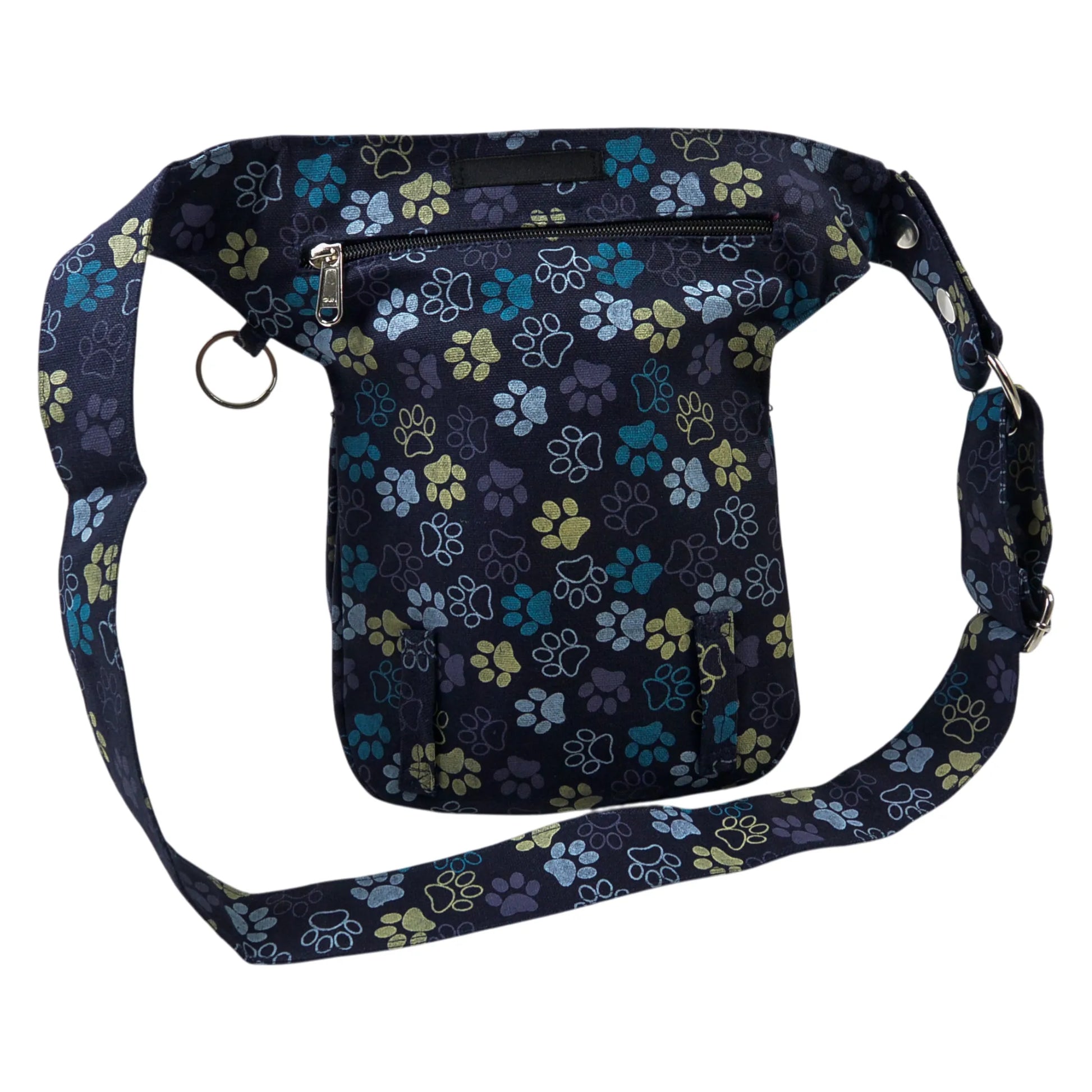 Nijens Gassitasche Hannover aus Canvas-Baumwolle in Blau-Lila mit Pfoten-Muster in Gelb, Rückansicht mit Reißverschlussfach und verstellbarem Gurt.