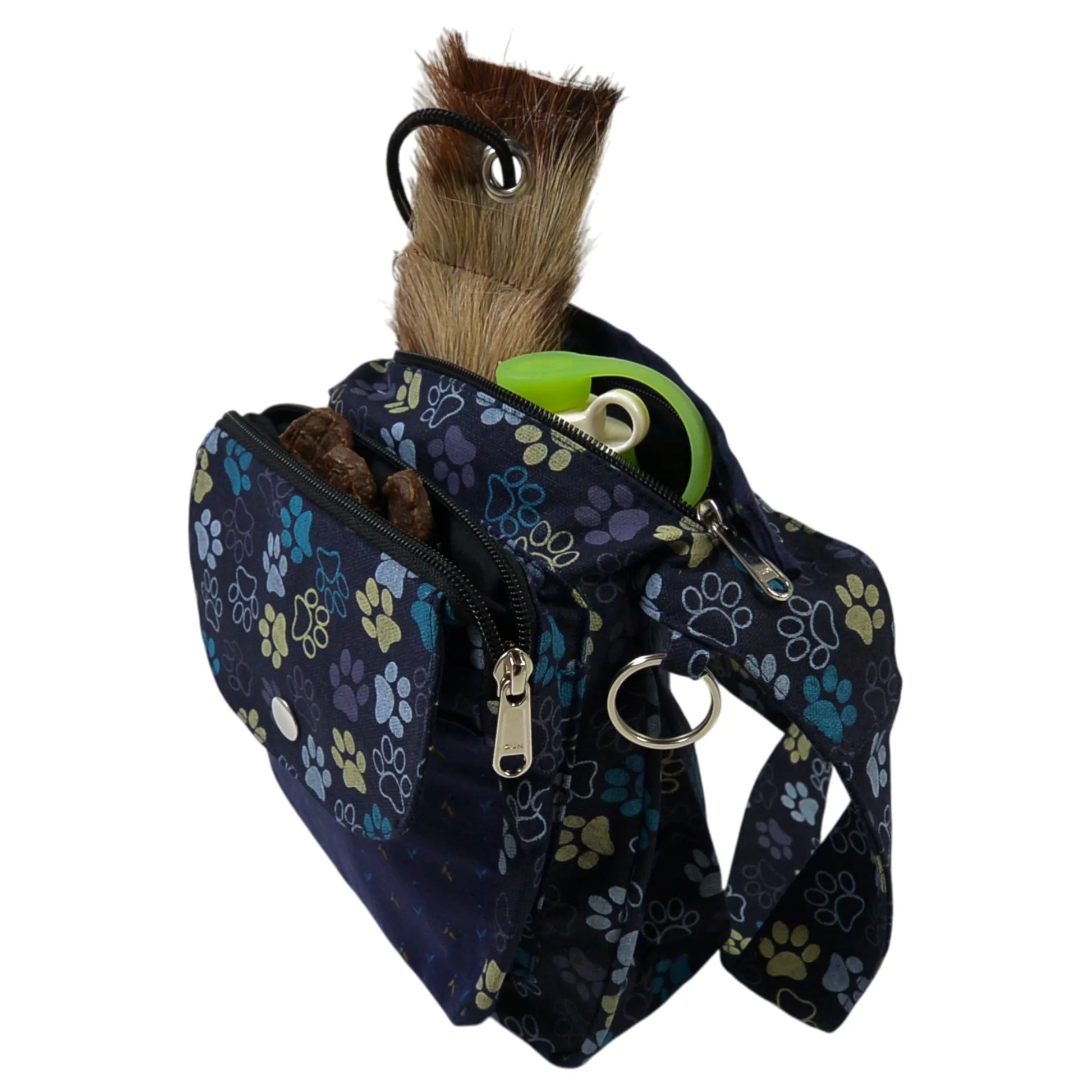 Nijens Gassitasche Hannover aus Canvas-Baumwolle in Blau-Lila mit Pfoten-Muster in Gelb, Seitenansicht mit Druckknopfklappe, Reißverschlussfach mit trinkflasche und Wurf-Dummy.