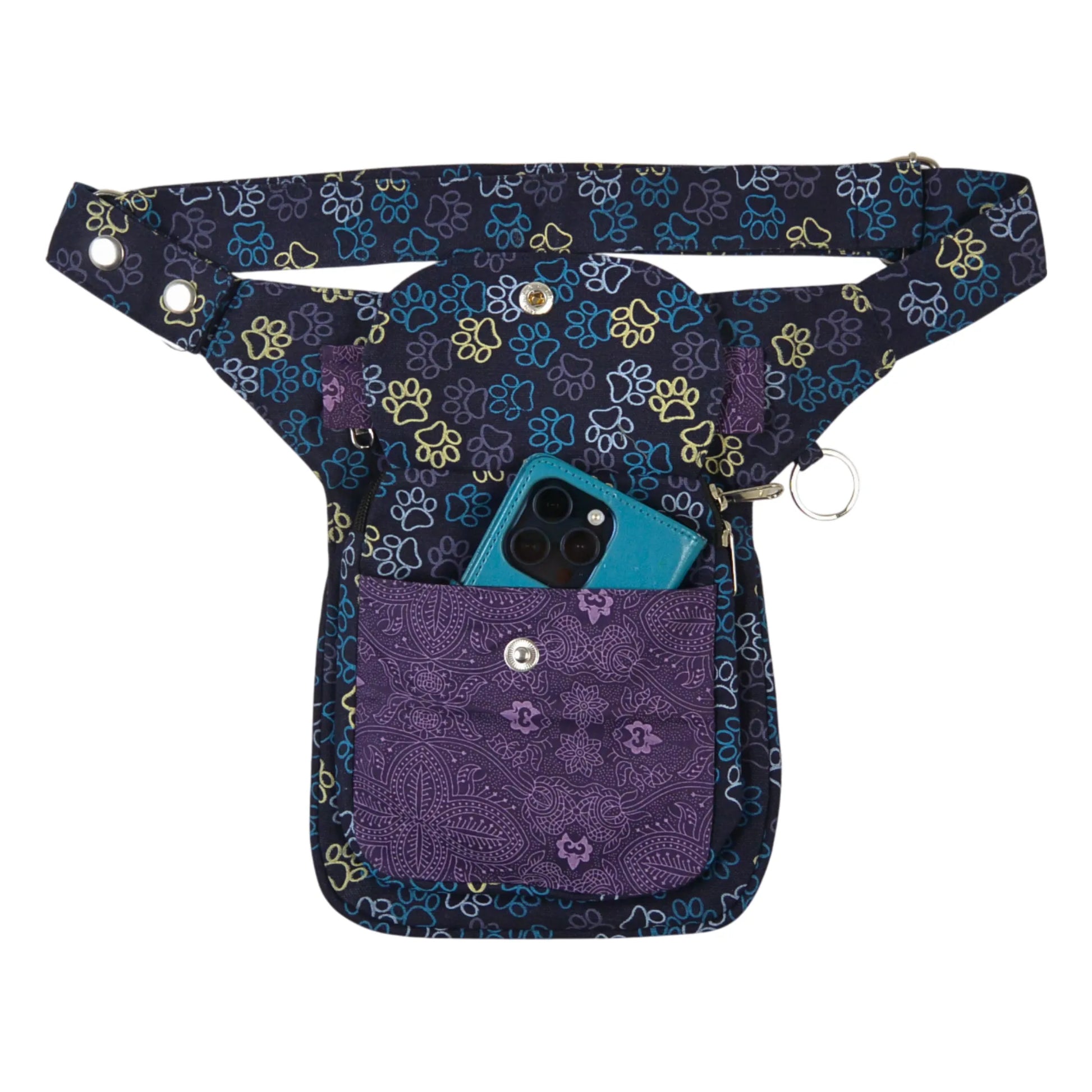 Offene Nijens Gassitasche Hannover aus Canvas-Baumwolle in Blau mit Lila Pfotenmuster, mit Handy im Fach.