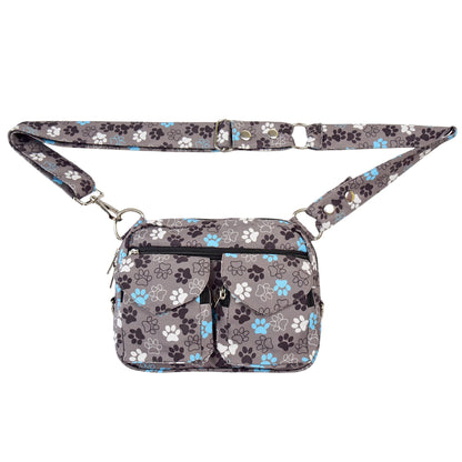 Gassi-Tasche in Grau-Türkis mit Pfotenmotiv. Wasserabweisend, mit 6 Fächern & 2 Leckerli-Fächern, mit Gürtel-Verlängerung als Crossbodybag tragbar.