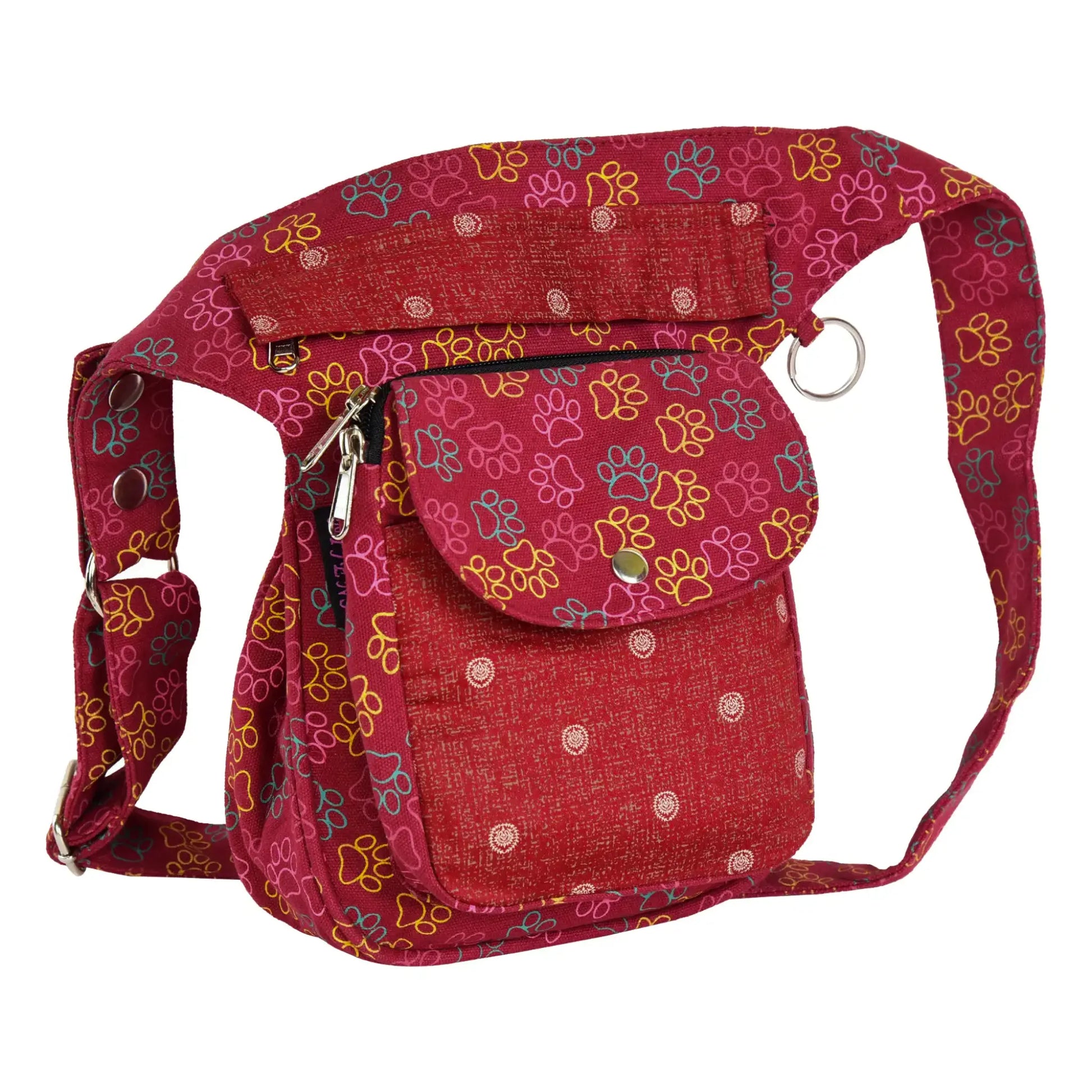 Seitenansicht der Nijens Gassi-Tasche in Rot mit buntem Pfotenmuster