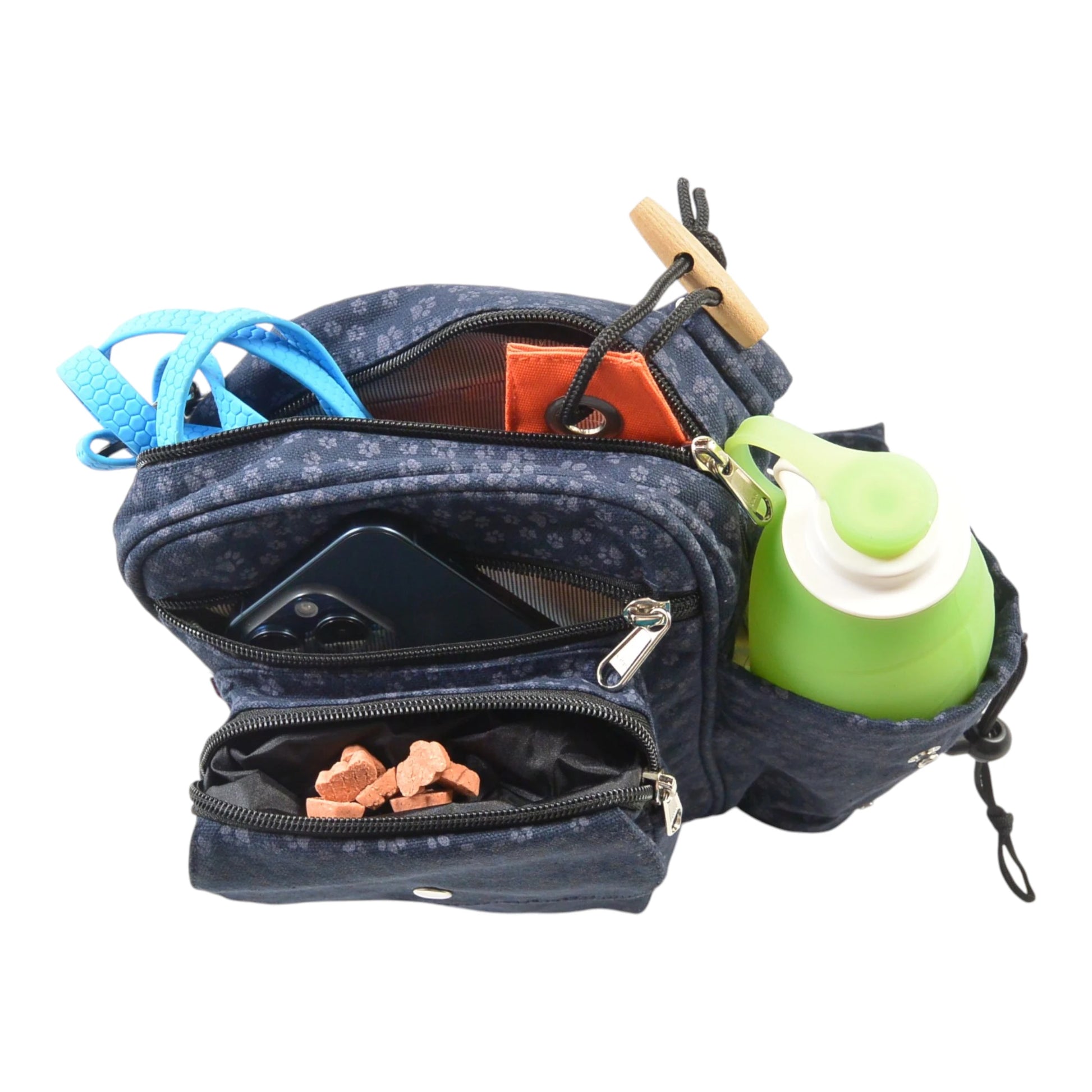 Stoff-Gassitasche von Nijens in Dunkelblau mit Pfotenmuster und integrierter Trinkflasche, mit Wurf-Dummy und Leckerlifach – ideal für Hundespaziergänge. Innenansicht.