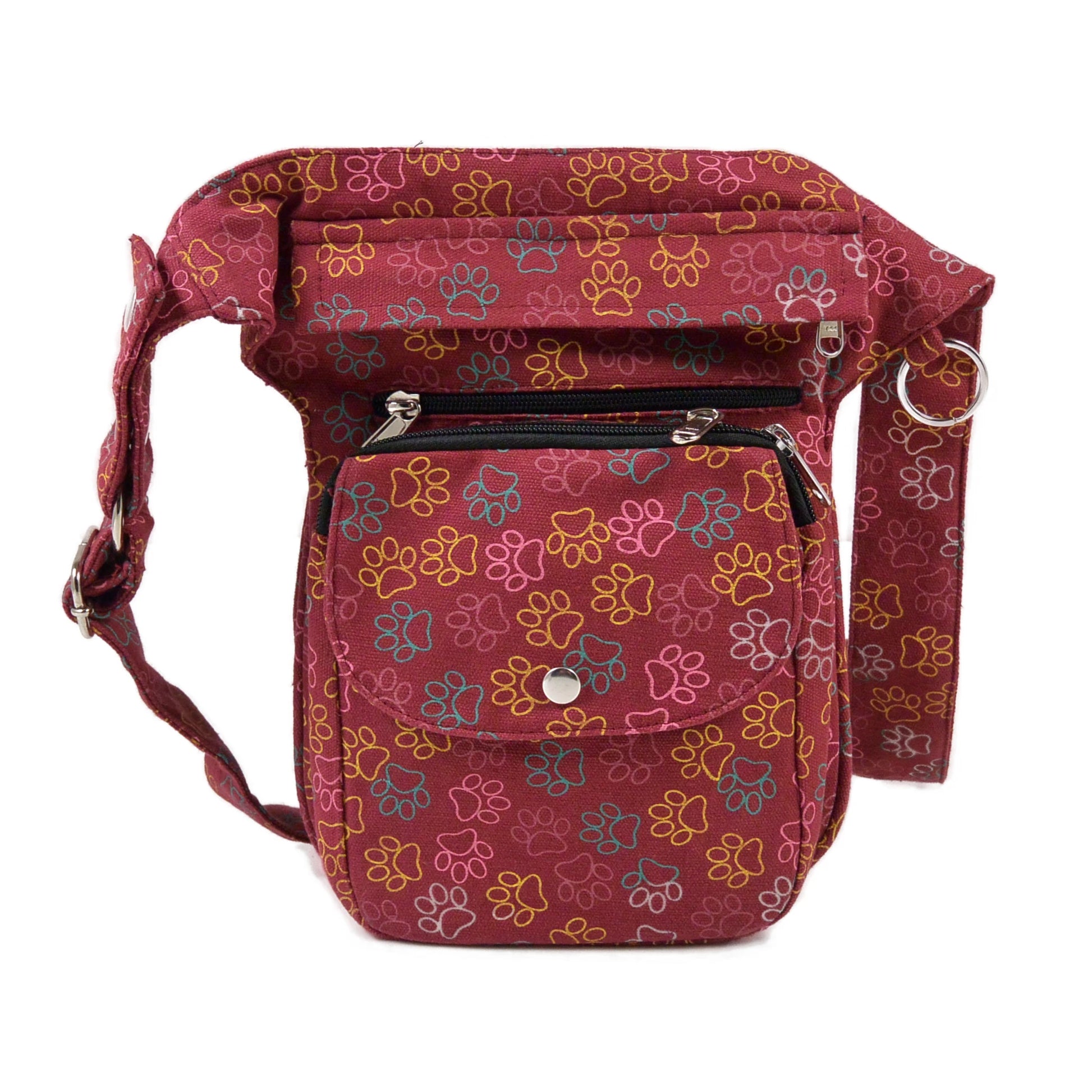 Gassitasche mit Pfotenmuster in Orange-Rot für Hundespaziergänge – mit Leckerlifach, Handyfach & verstellbarem Gurt. Frontansicht.