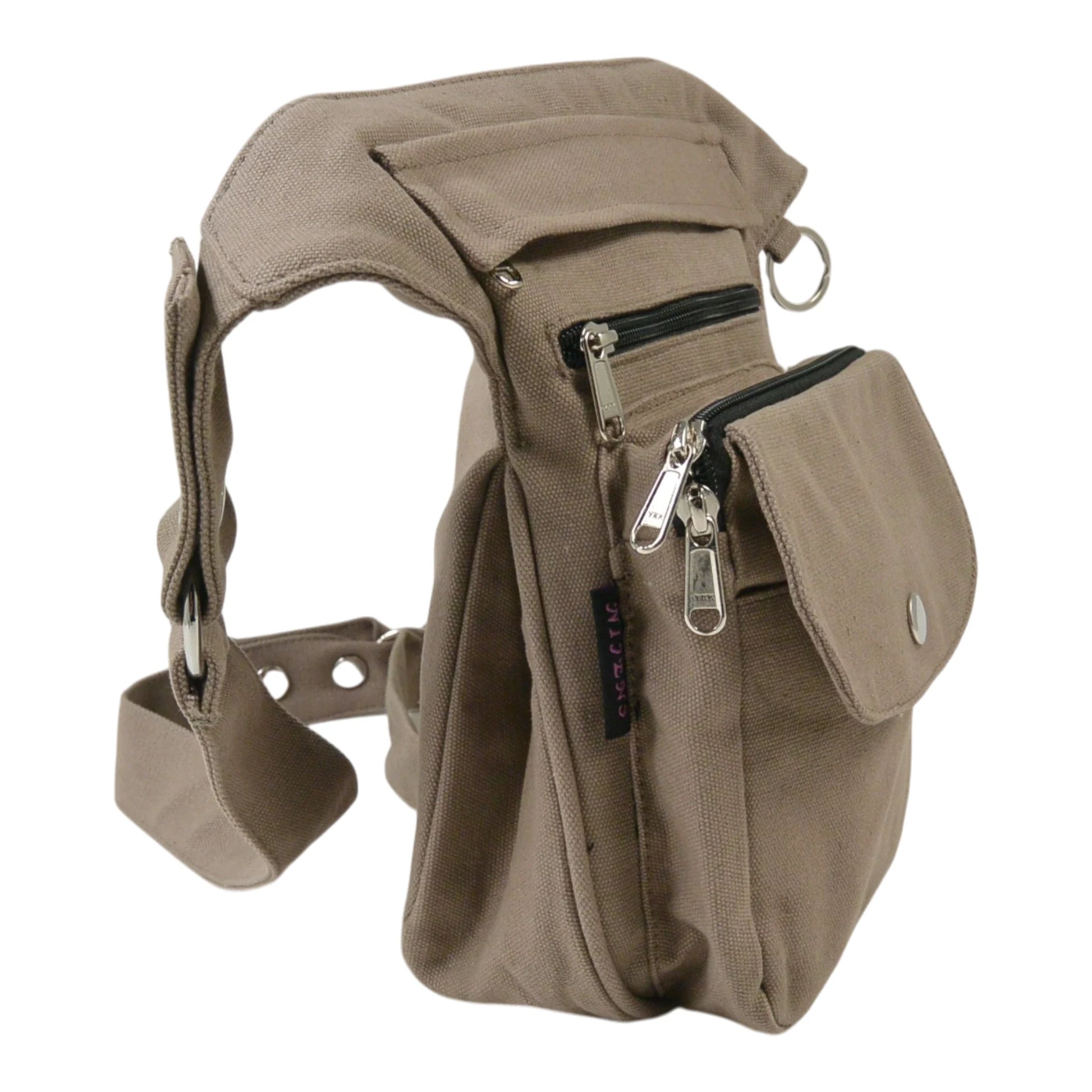 Seitliche Ansicht der beigefarbenen Gassi-Tasche Super-Hannover aus strapazierfähigem Canvas mit mehreren Reißverschlussfächern und Druckknopftasche