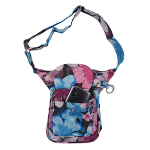 Gassi-Tasche, Bauchtasche und Gürteltasche aus Polyester Blau , Magentafarben mit Blumenblätter Motiven.  Der Taschengurt ist größenverstellbar und das Einsteckfach vorne bietet Platz für das Handy und wird durch einen Überschlag mit Klett und Druckknopf verschlossen.