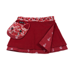 Wenderock für Kinder aus Kordsamt Rot mit abnehmbarem Katzenkopftäschchen und gläserner Druckknopfleiste.
