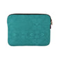 Rückseite der Laptop Hülle von Nijens in Türkis mit dezentem Mandala-Ornamentmuster
