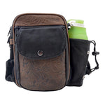 Gassi-Tasche Konstanz in Schwarz-Braun aus robustem Canvas mit geprägtem braunem Echtleder, Frontansicht mit mehreren Reißverschlussfächern und Trinkflasche