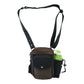 Gassi-Tasche Konstanz in Schwarz-Braun aus robustem Canvas mit geprägtem braunem Echtleder, Frontansicht mit mehreren Reißverschlussfächern und Gürtel-Verlängerung.