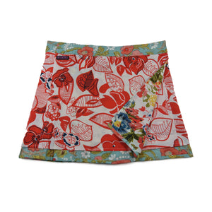 Wenderock, Wickelrock aus Baumwolle, Weiß/Rot, mit Blättermotiven und kleinem Einsteckfach vorne. Umfang ist einstellbar mit Druckknöpfen am Rockbund.