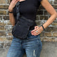 Schwarze Bauchtasche Paris von Nijens mit floralem Muster und Punkten, lässig als Crossbody-Tasche getragenter