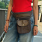 Braun-graue NIJENS Super-Hannover Gassi-Tasche im Vintage-Look mit Lederdetails und Herz-Pfoten-Prägung, als Hüfttasche getragen.