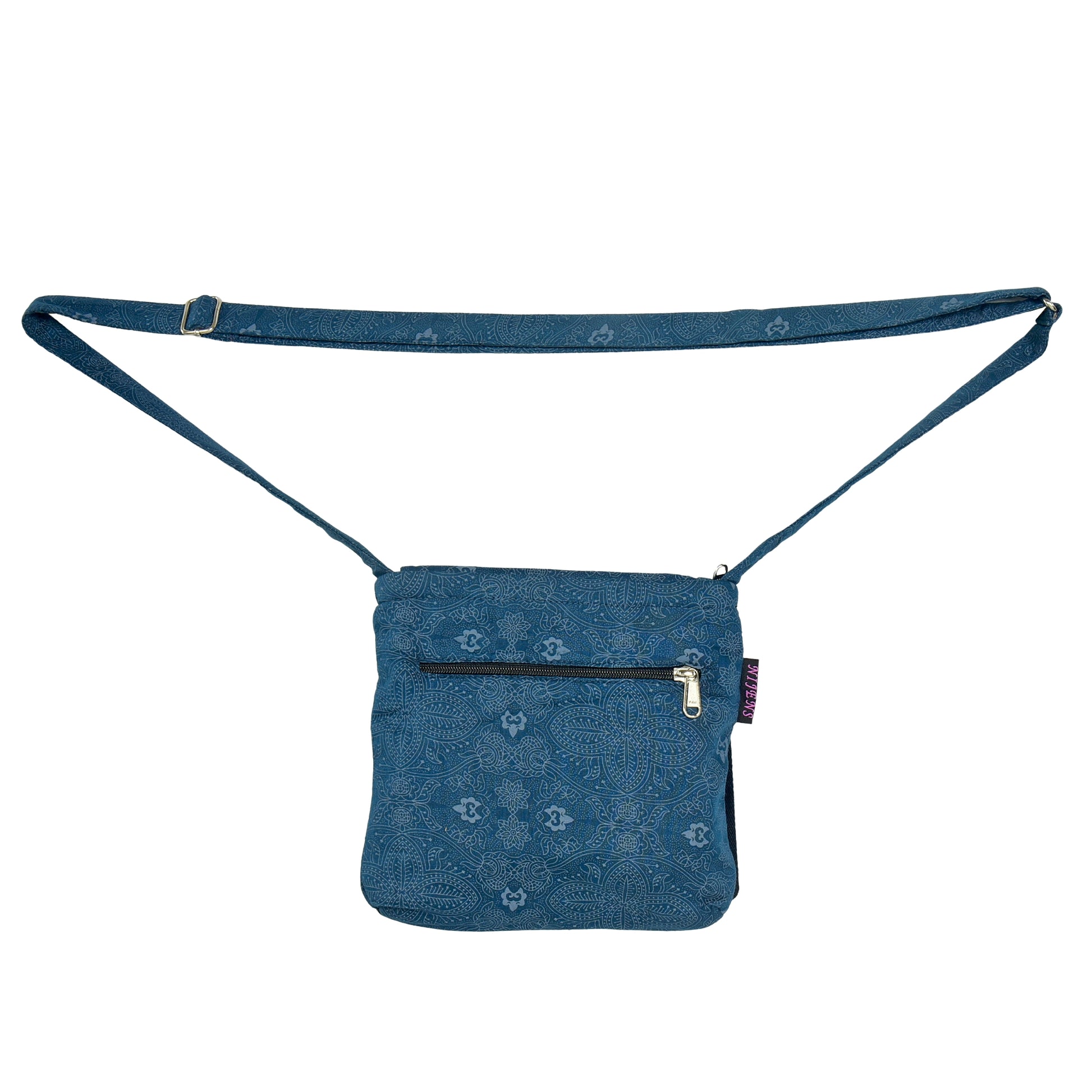 Hinteransicht: Kleine Tasche, Umhängetasche aus Baumwolle, Petrol mit floralen Ornamenten. Auf der hinteren Seite befindet sich ein Reißverschlussfach.