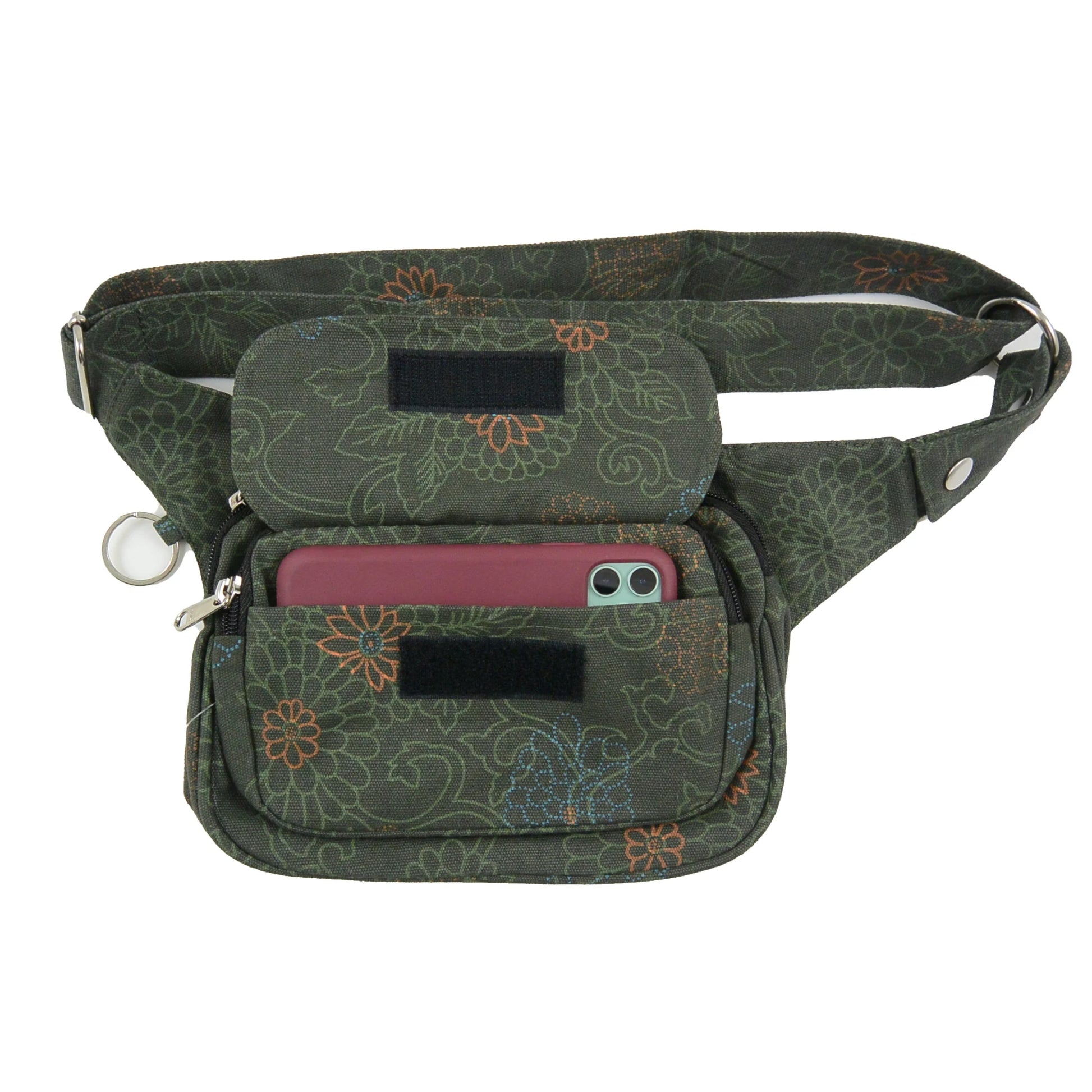 Geöffnete Gassi-Tasche Frankfurt in Dunkelgrün mit Blumenmuster – Innenansicht mit Smartphone.