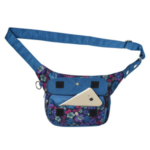 Nijens Gassitasche in Blau mit Blumenmuster und Handyfach, Vorderseite mit geöffneter Klappe und sichtbarem Smartphone. Nijens Shop