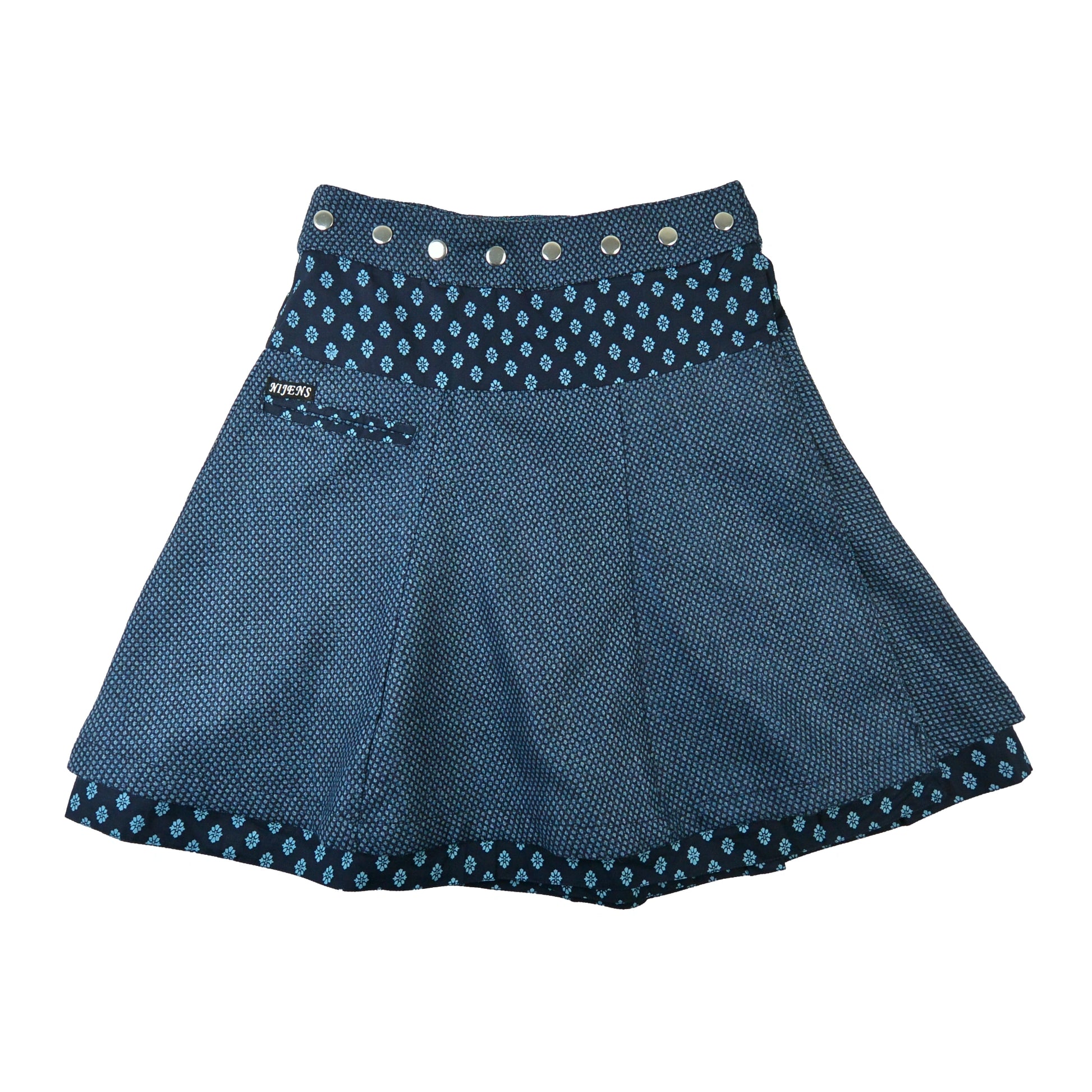 Nijens Tweed-Wenderock in Blau mit gemustertem Bund und kleiner Tasche. Warmer Wickelrock für den Winter mit reversibler Trageoption.