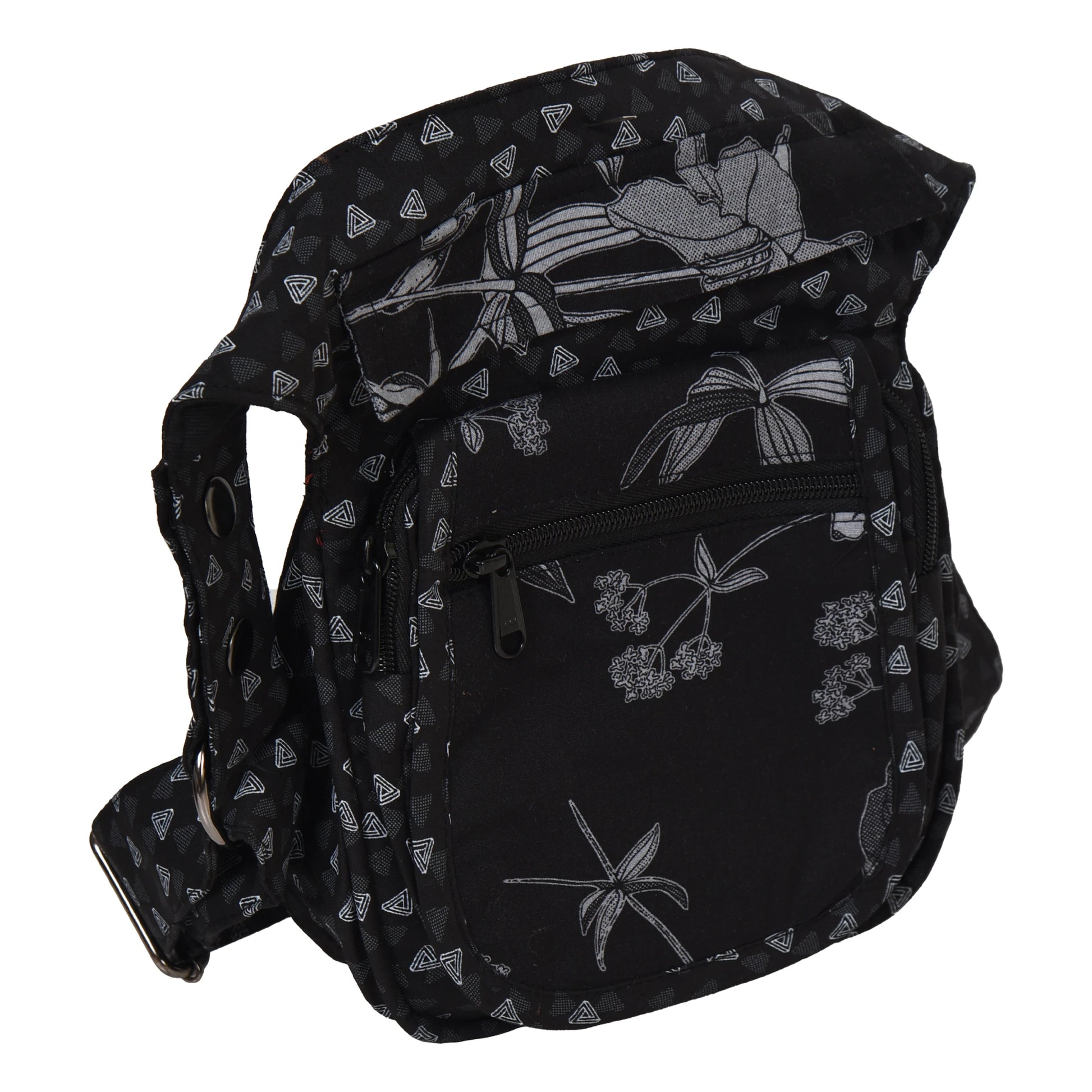 Schwarze Gürteltasche mit Lilien Motiv. Diese Tasche verfügt über 4 Reißverschlussfächer. Das Hauptfach hat einen Überlappungsschutz.