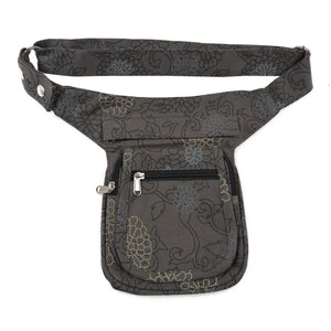Bauchtasche aus robustem Baumwollstoff in Grau mit floralen Ornamenten. Diese Gürteltasche besitzt drei Reißverschlussfächer vorne sowie ein Einsteckfach.