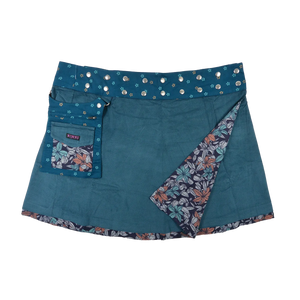 Wenderock XL aus Kordsamt in Petrol  mit abnehmbarer Seitentasche. Rockbund ist aus Baumwolle Petrol  mit Blumen Motiven und doppelter Druckknopfleiste.