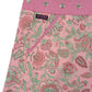 Wenderock, Wickelrock aus Rayonstoff in Rosa mit Blumenmuster. Der Umfang ist einstellbar mit einer Druckknopfleiste. Ausschnitt Eingrifftasche an der Seite.