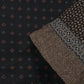 Wollrock, Kombination aus zeitlosem Tweed mit aufgesertem Schmuckband am Saum, dunkelbraune Farbe