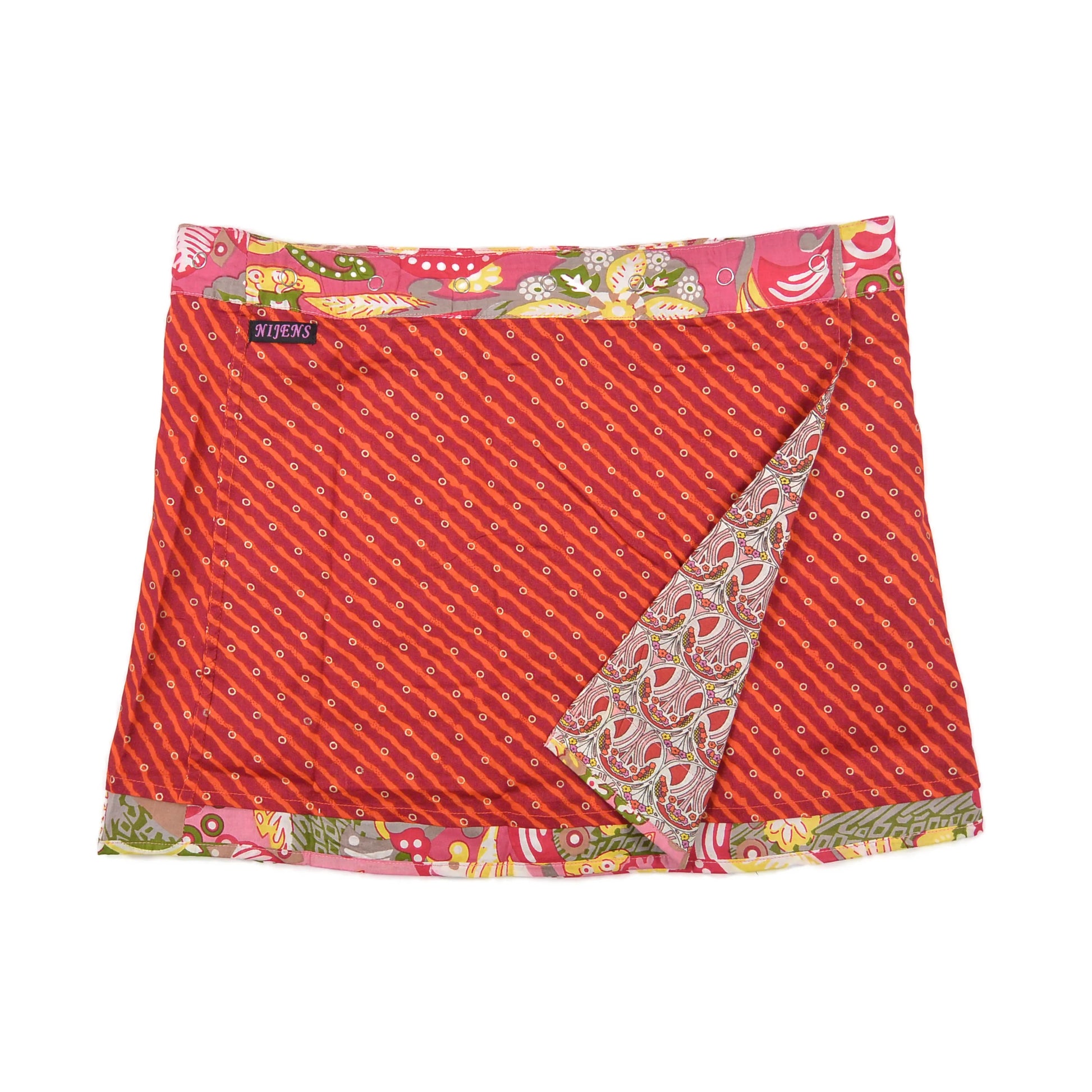 Wenderock aus Baumwolle in Rot mit Paisley mit kleinem Einsteckfach vorne. Umfang ist einstellbar mit gläsernen Druckknöpfen am Rockbund. Muster und Farbenmix.